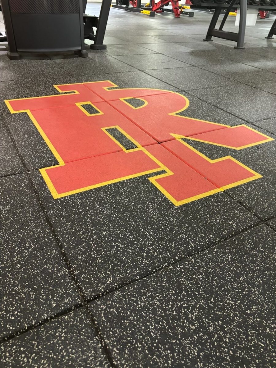 This rubber flooring allows for more activities for be going on at once. You can lift on the entire floor safely, rather than needing to lift solely on platforms, again showcasing our RI logo. 
